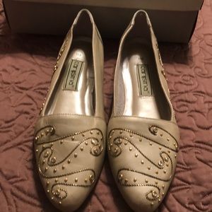 Gold embellished shoes